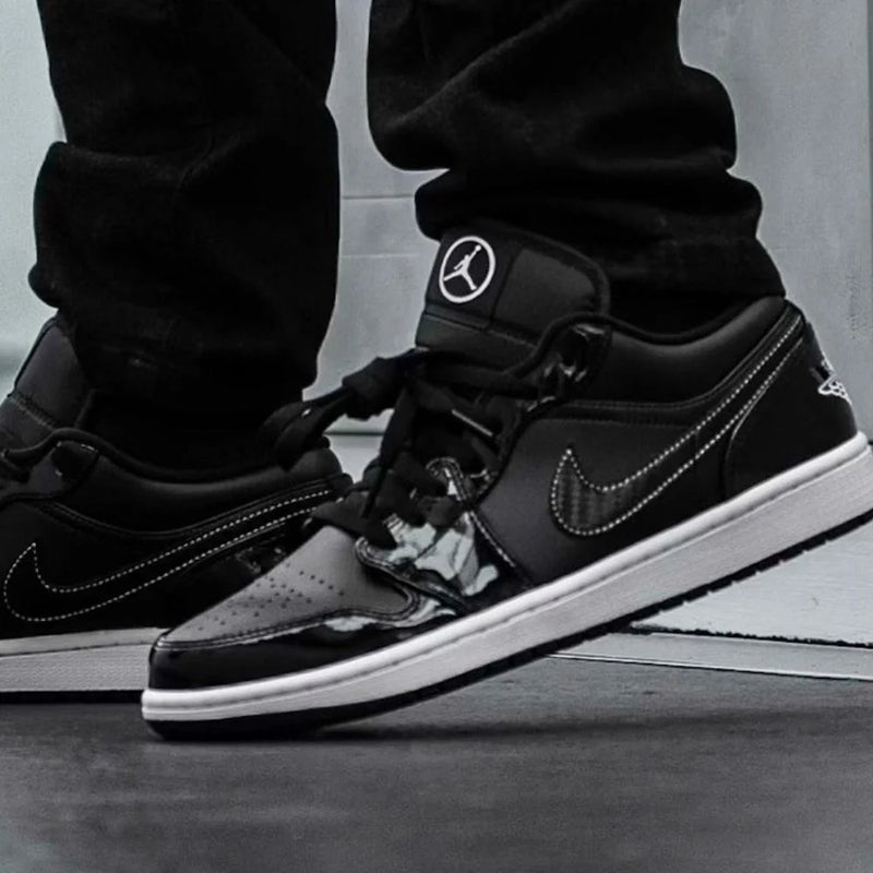 Air Jordan 1 Low Black Patent Leather Sneakers